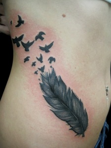 feather-tattoos-for-girls-on-ribs-69