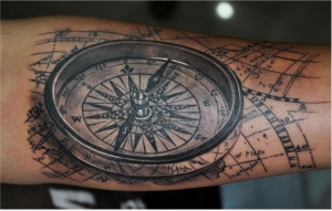 map compass traveller adventure on arm tattoo design by best tattoo artist in mumbai subhojit chakroborty eric jason dsouza from best tattoo parlour studio in india iron buzz tattoos mum